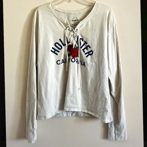 Hollister Long sleeve white top, with a red rose on the front